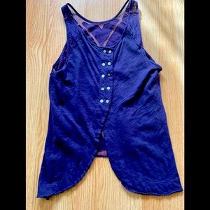 Free people cropped top with lace/mesh back.